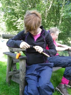 Bush craft learning to use a knife safely